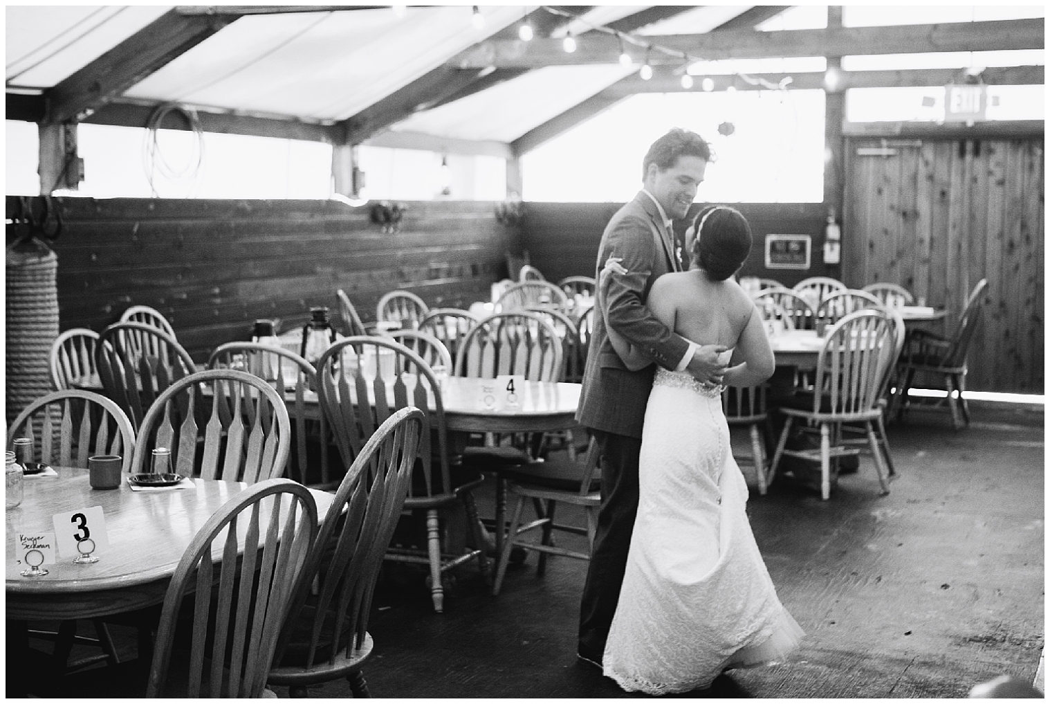 Bride and groom dance in an empty dining area at their Breckenridge elopement.