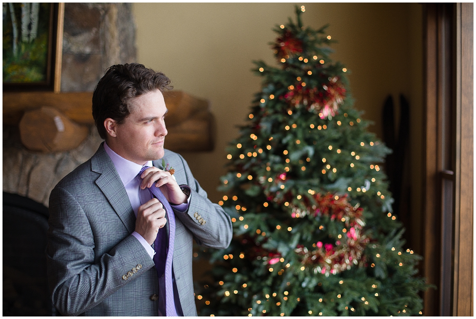 Groom getting ready for his Breckenridge elopement in a mountain cabin.