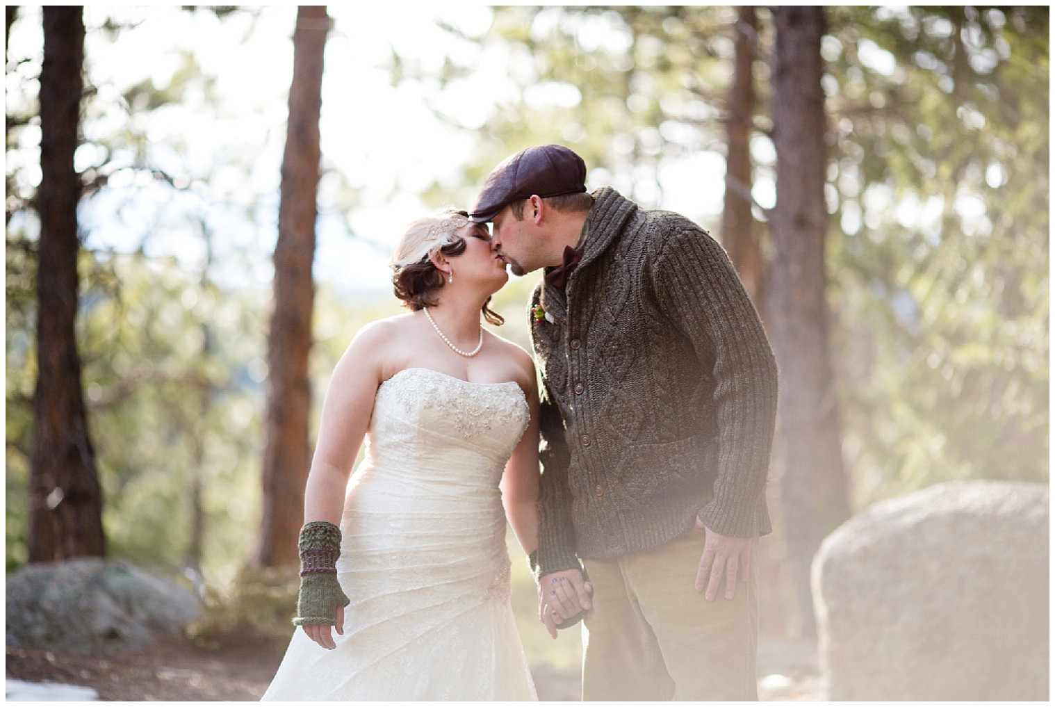 The wedding couple kiss at their Boulder Colorado mountain elopement.