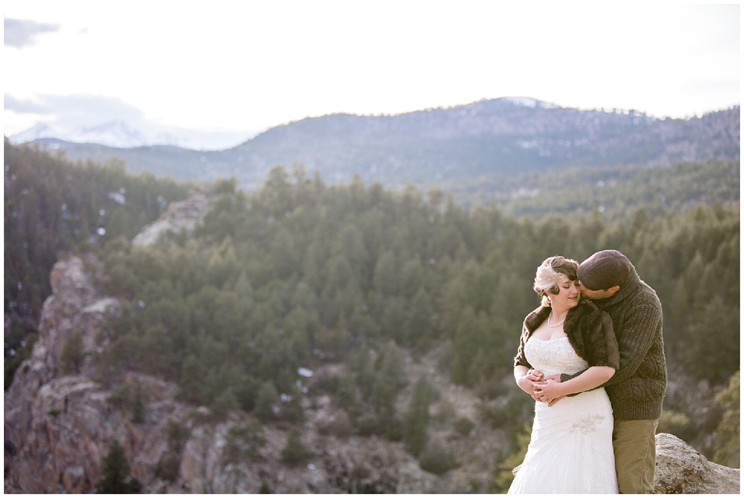 Bride and groom hug for portraits at their Boulder Colorado mountain elopement.