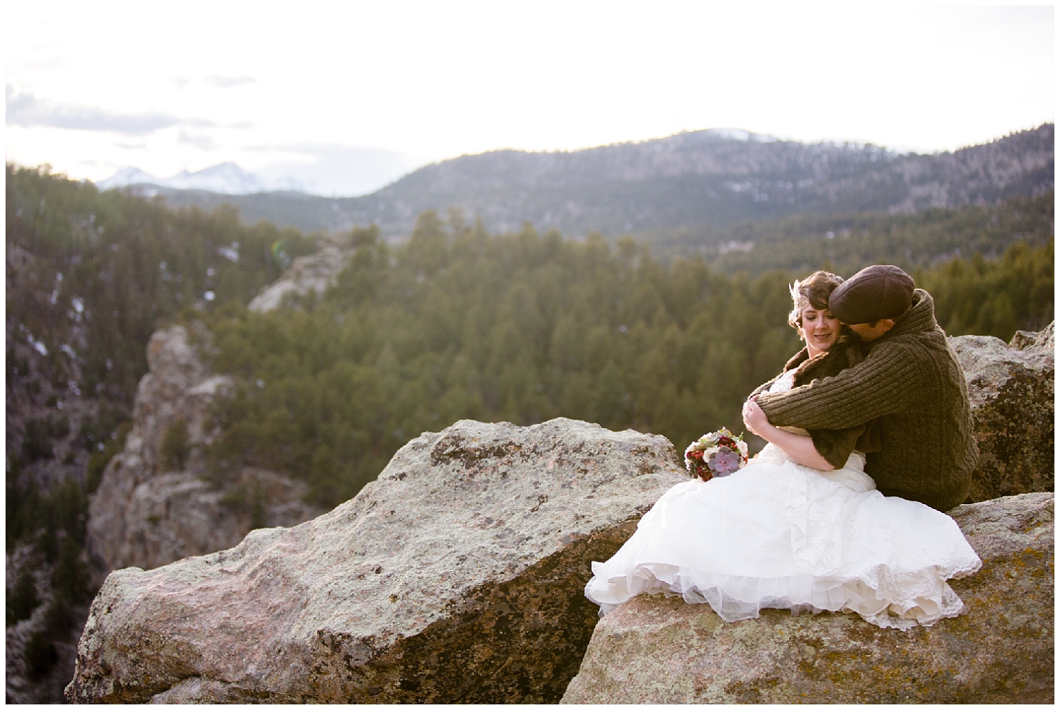Bride and groom snuggle close together for elopement portraits at their Boulder elopement.