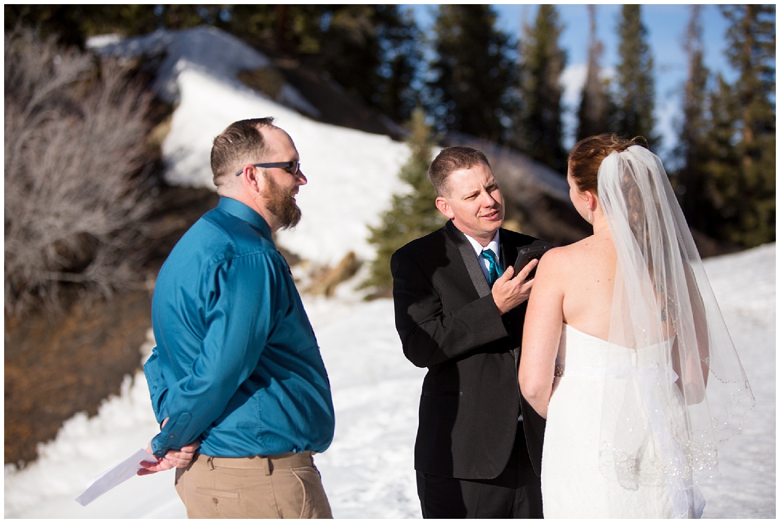 Groom reads his vows off of his phone at his Breckenridge Colorado elopement.
