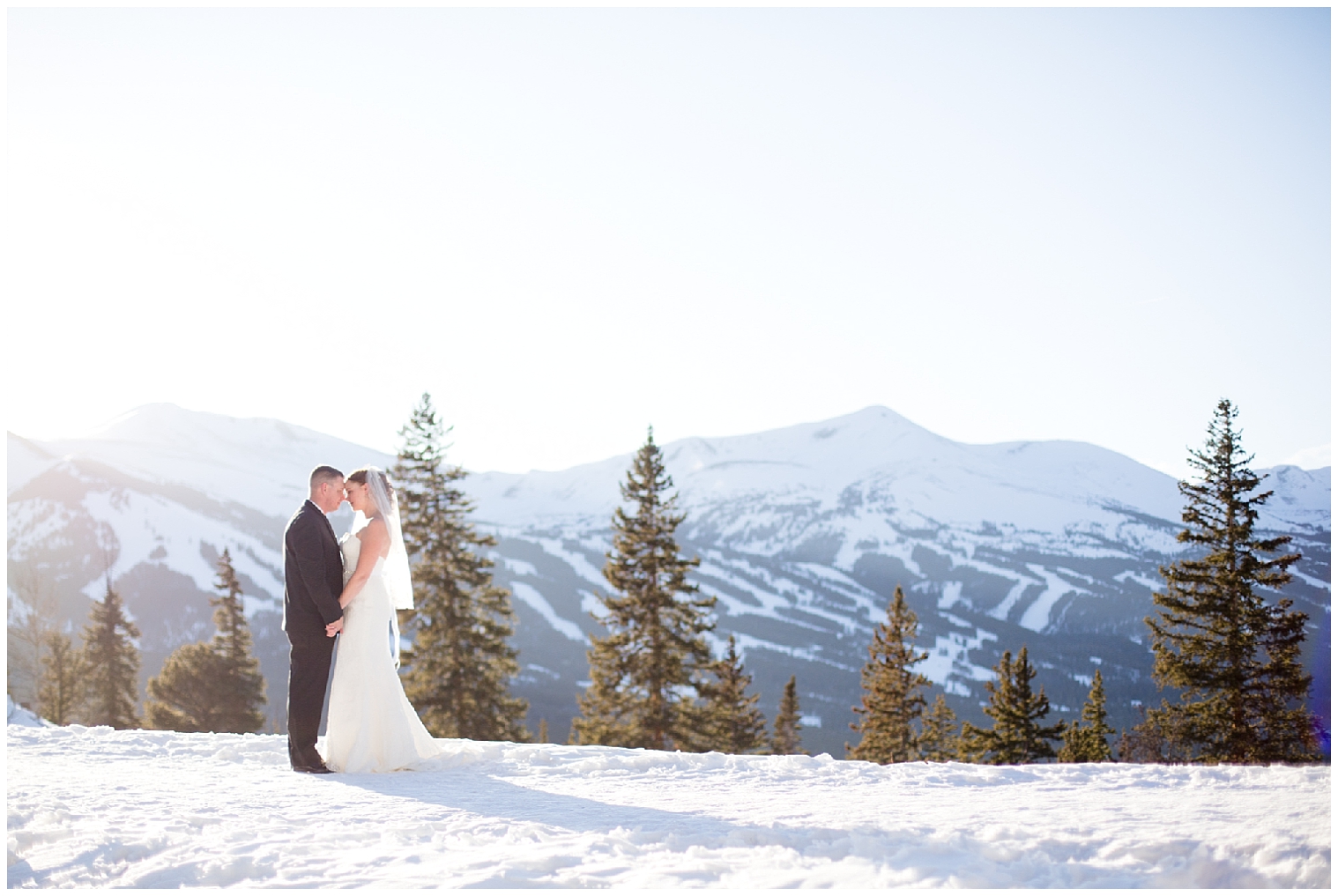 Wedding couple hold each other close during mountaintop portraits at their Boreas Pass elopement.