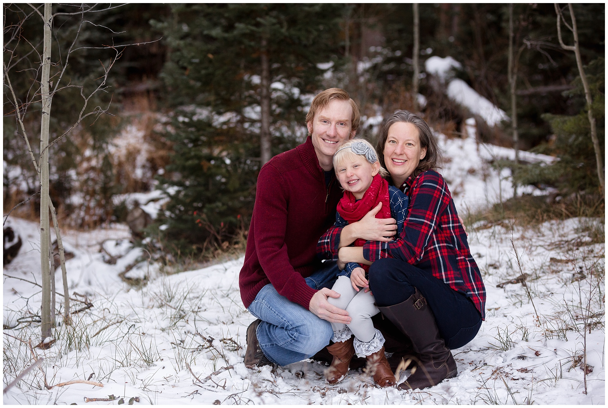 Colorado family holds each other close during a photo session with a Breckenridge family photographer.