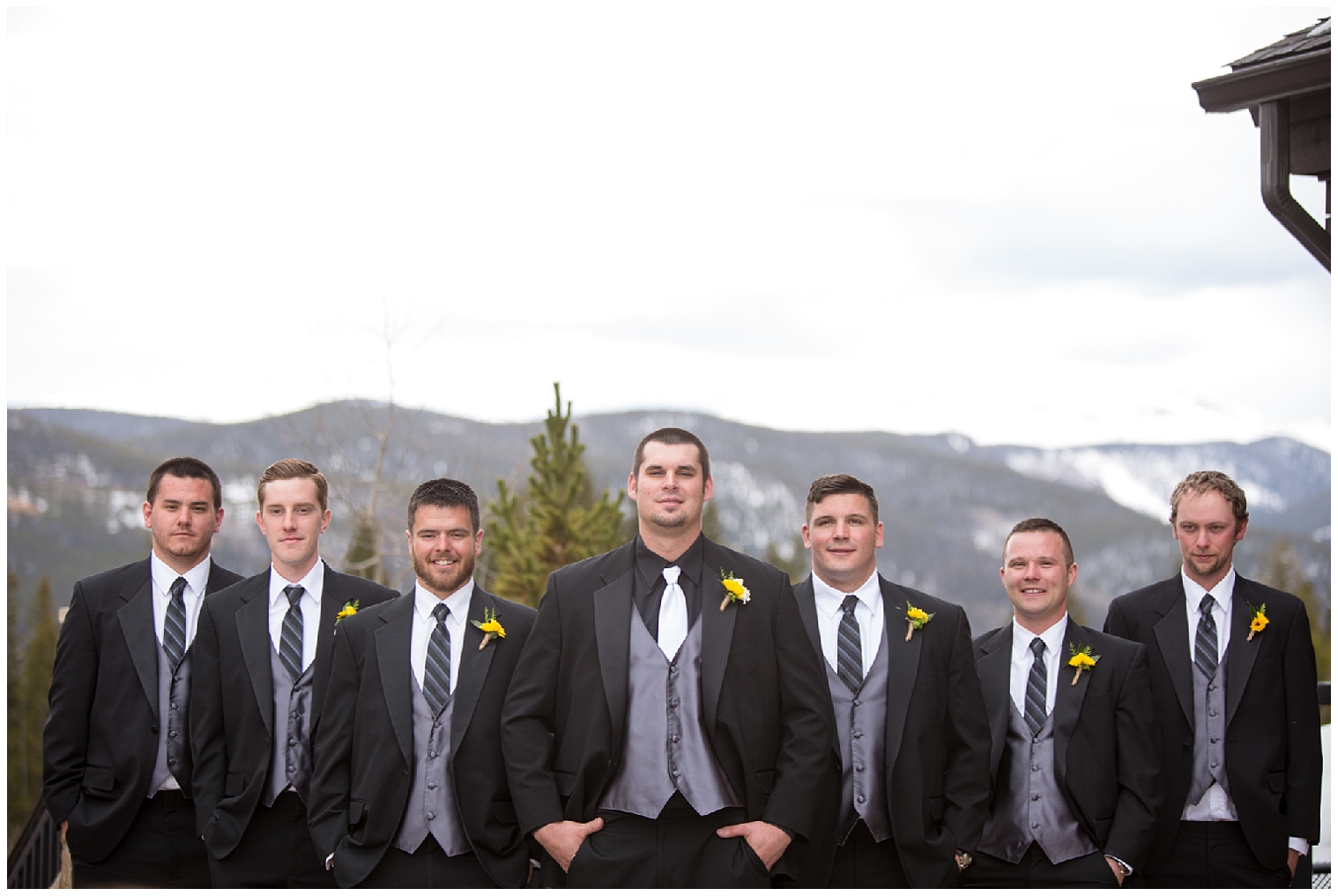 Formal portrait of the groom with his groomsmen, at a mountain Colorado wedding.