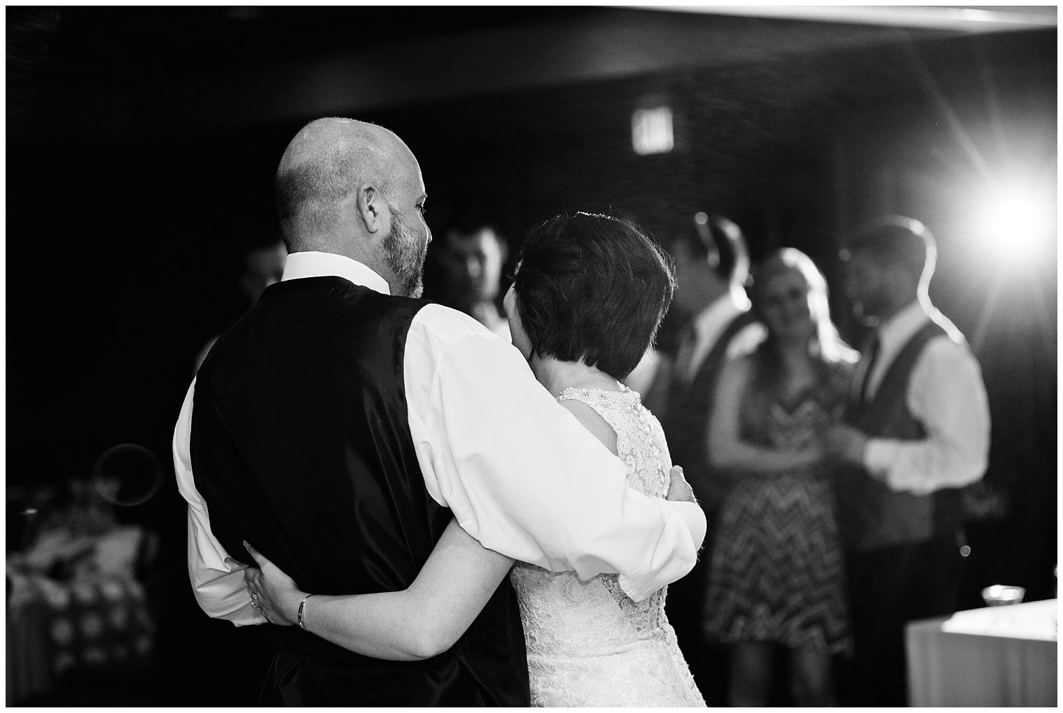 Bride dances with her father during their father-daughter dance at her Breckenridge mountain wedding.
