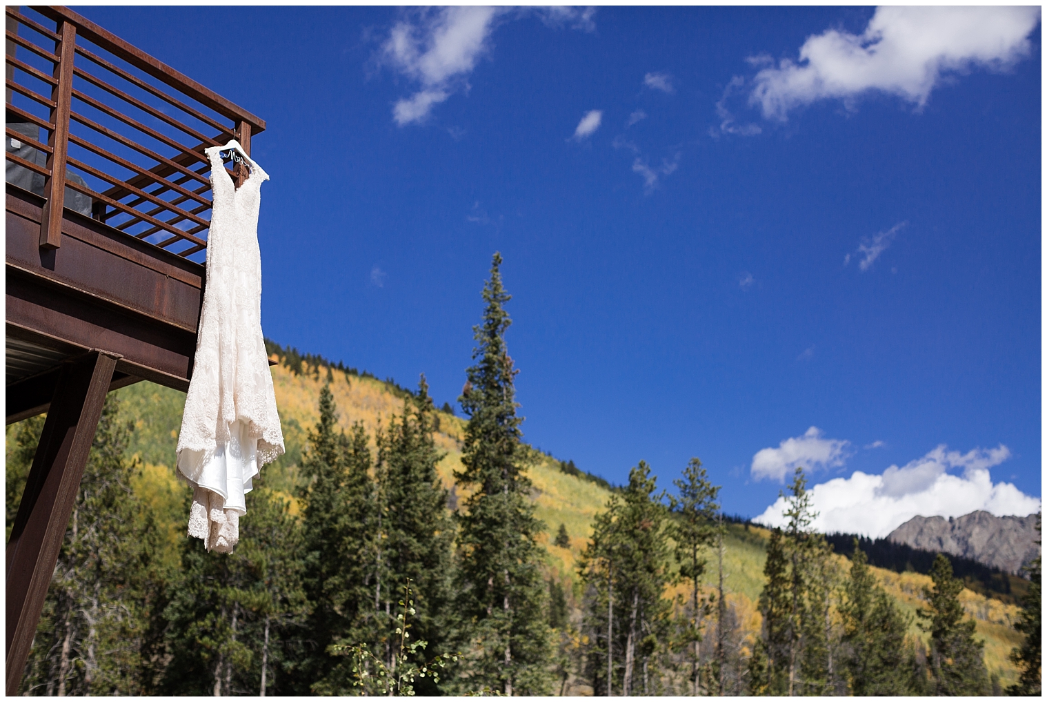Dress hanging from the balcony at a Copper Mountain wedding.