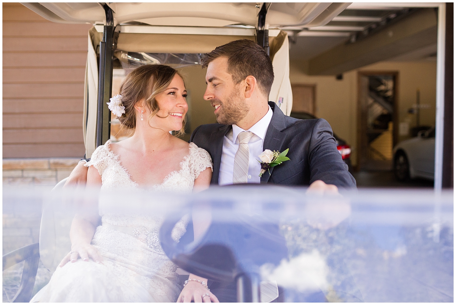 On their Copper Mountain wedding day, the bride and groom ride in a golf cart together.
