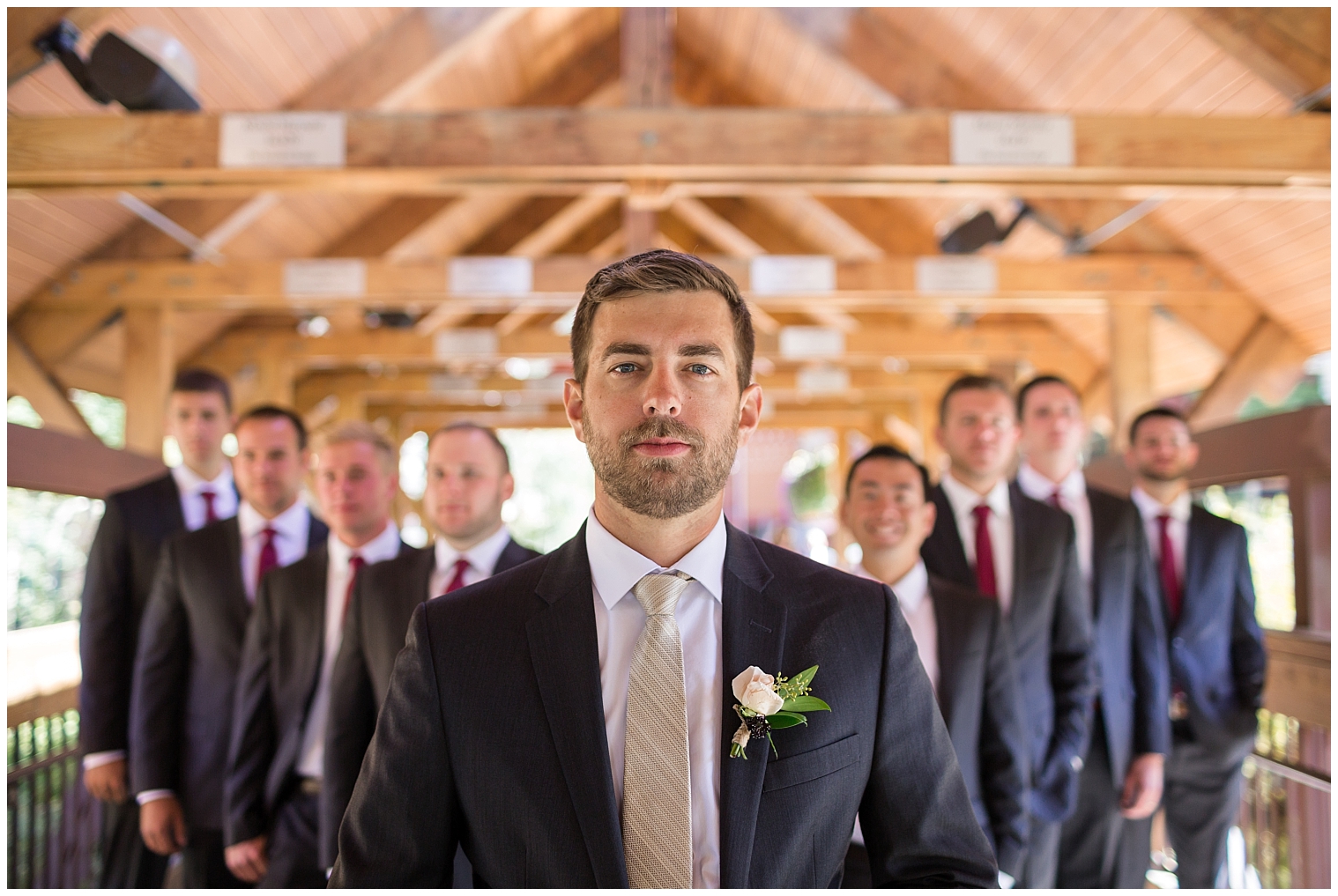 Groom poses with his groomsmen at his Copper Mountain wedding.