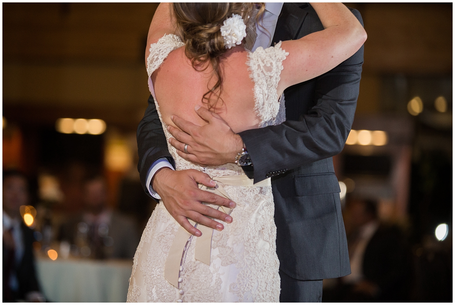 The groom embraces his new bride during their first dance at their Copper Mountain wedding.