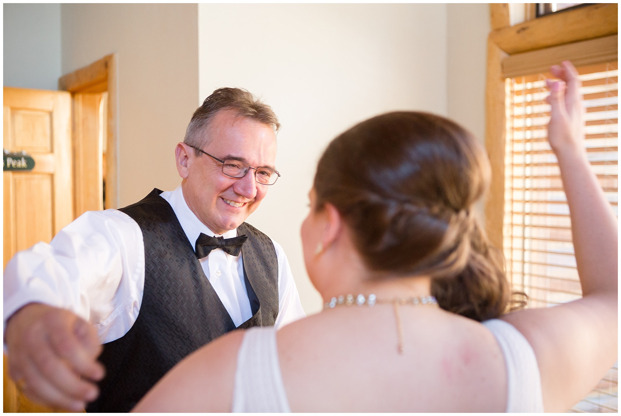 Bride's father sees his daughter for the first time on her Breckenridge wedding day.