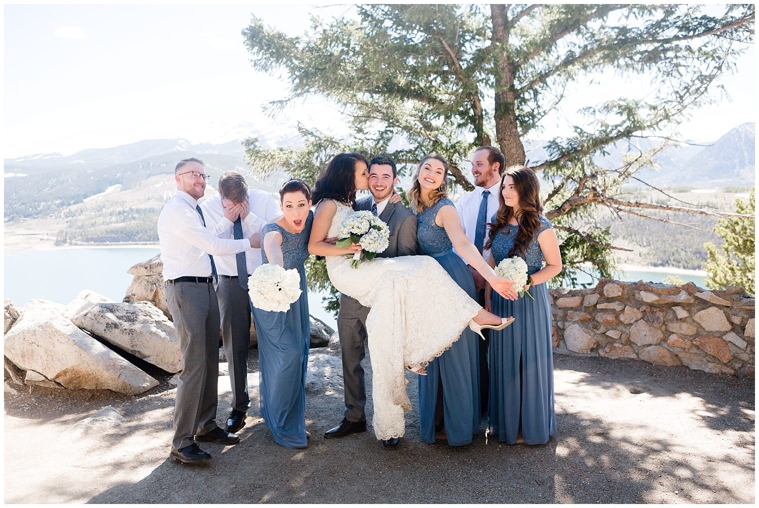 Bridal party poses for a silly photo with a Colorado elopement photographer.
