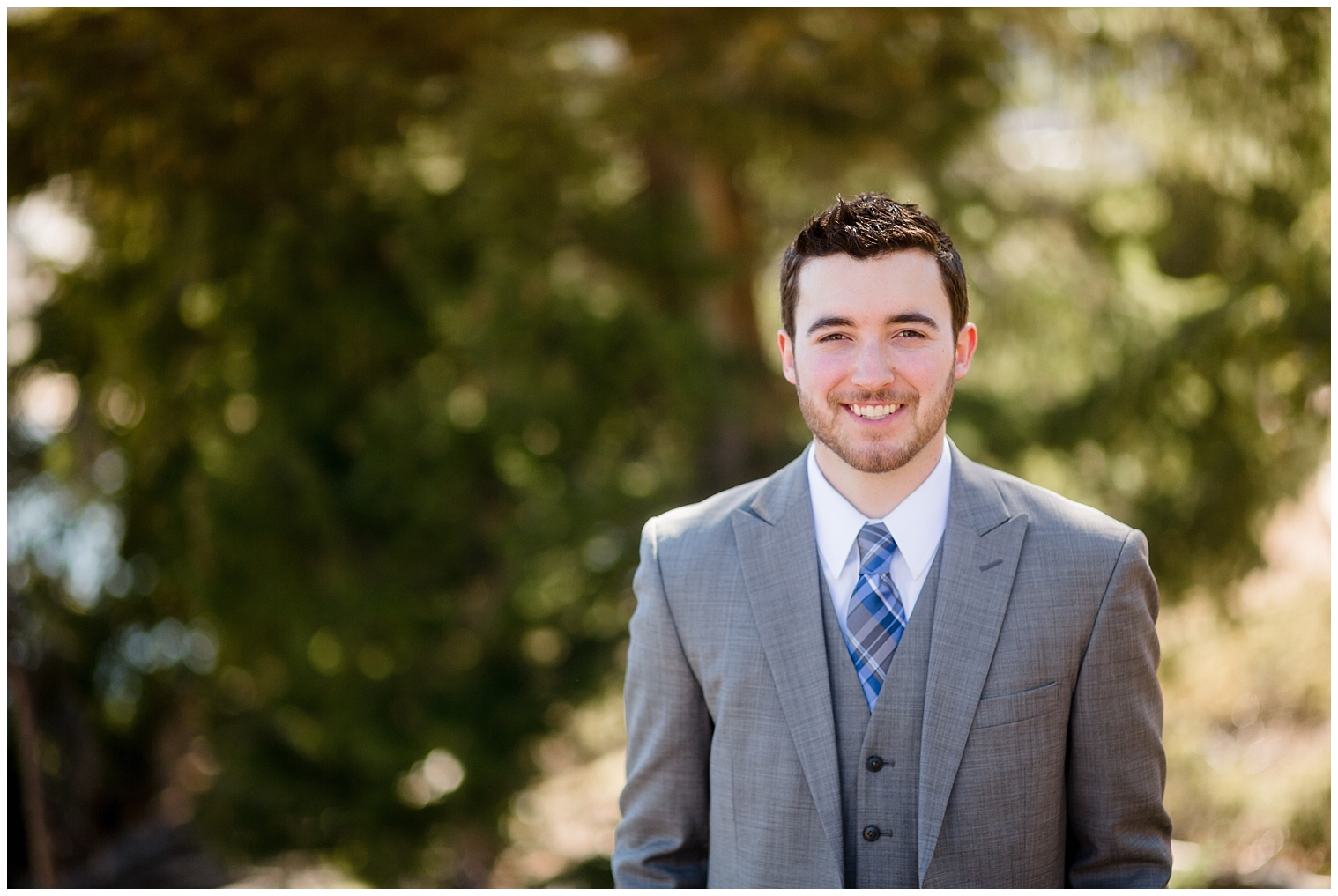 Portrait of a groom at his Breckenridge elopement by a Colorado mountain wedding photographer.