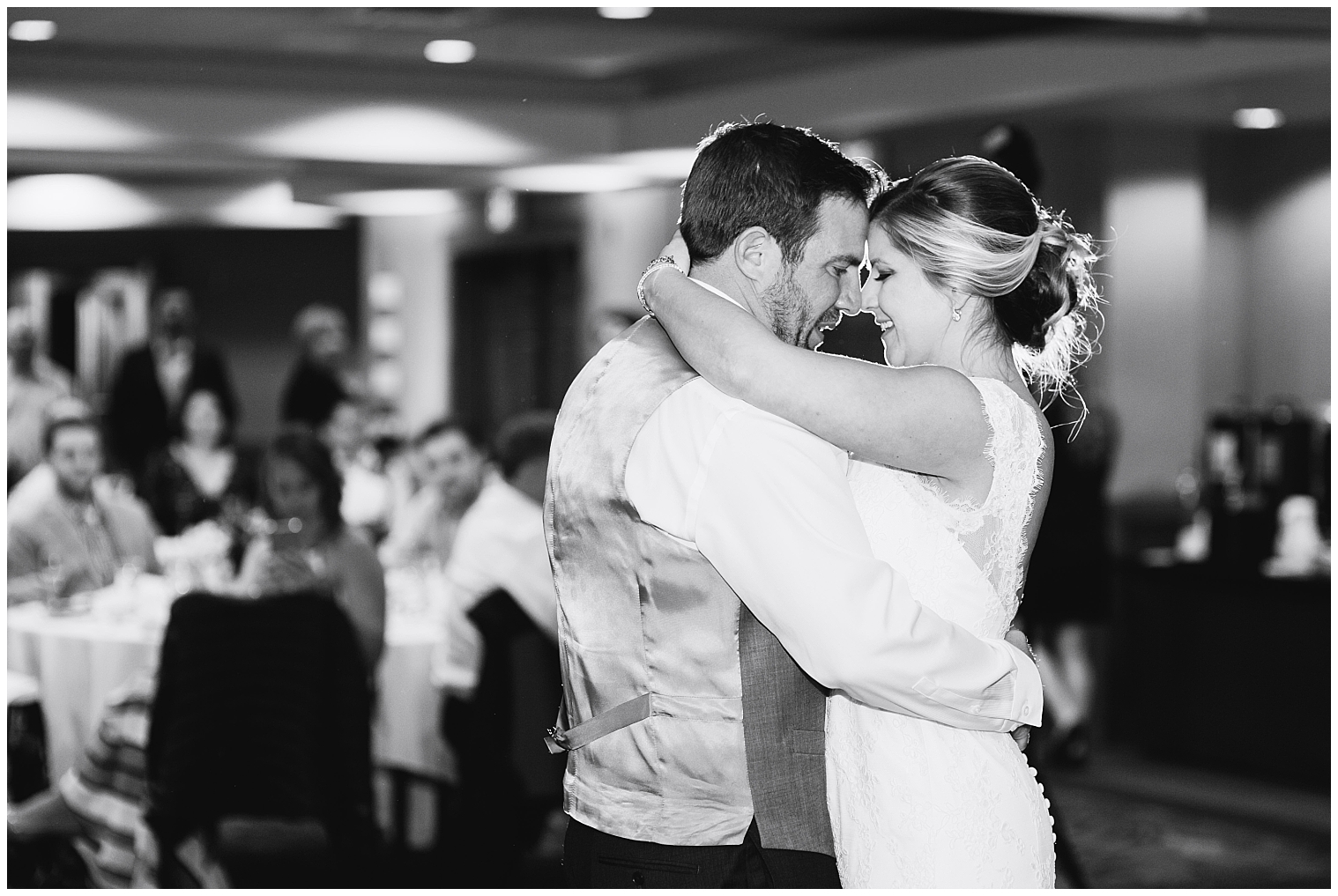 The wedding couple share their first dance at their Breckenridge wedding reception.