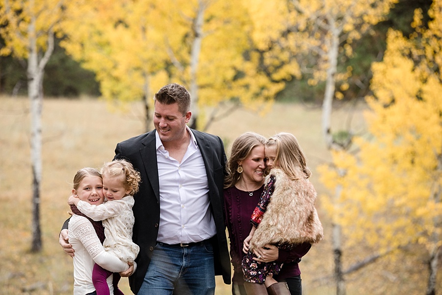 family posing together in conifer Colorado