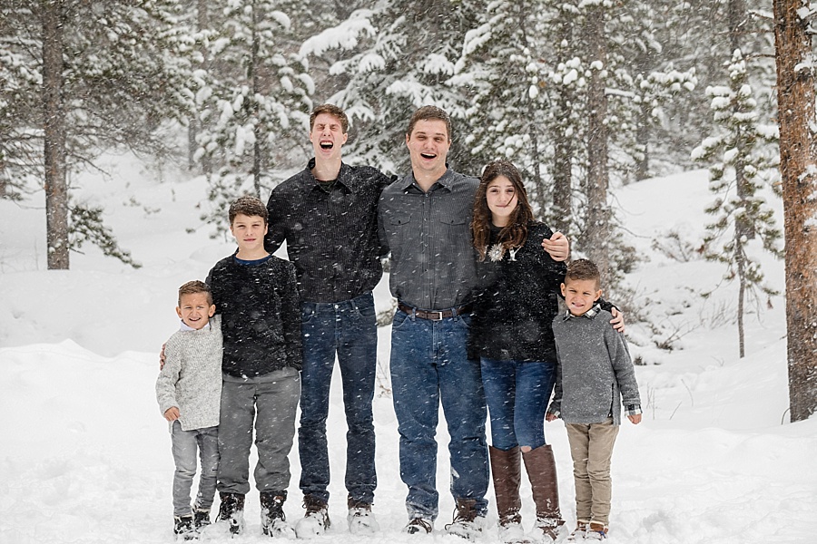six grandchildren pose together in the snow in Breckenridge 