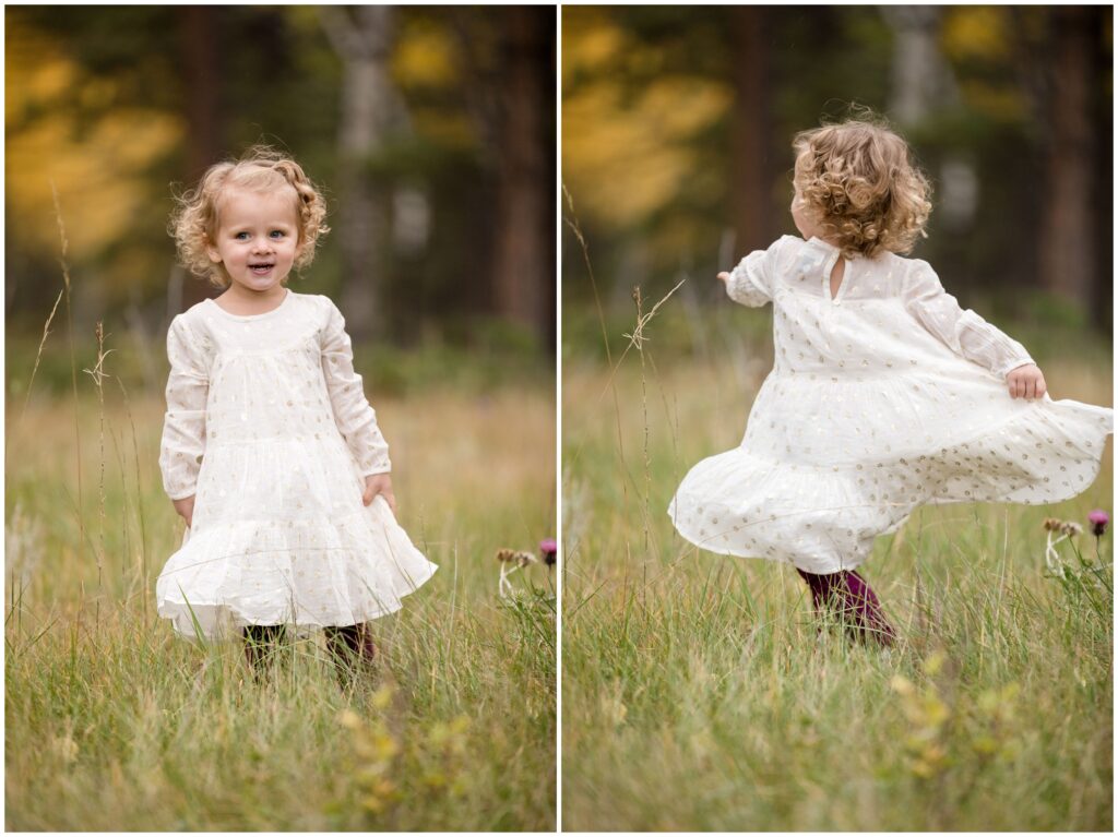 toddler in white dress playing in the fall mountains in conifer Colorado